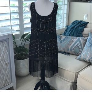 Ark & Co black dress with gold studs and fringe hem
